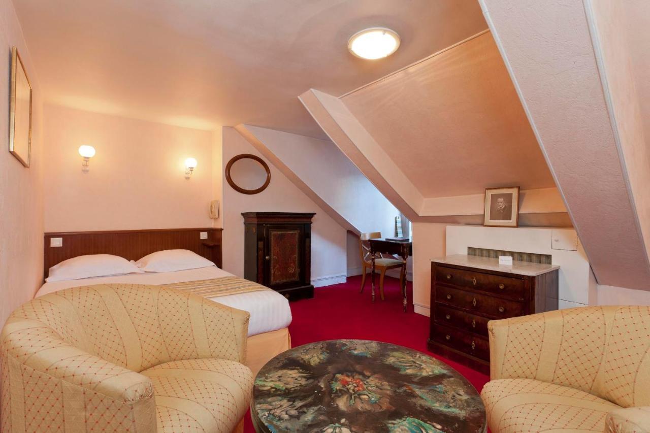 Hotel Du Quai Voltaire Paris Rum bild